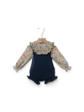 Salopette in maglia con camicia fantasia floreale